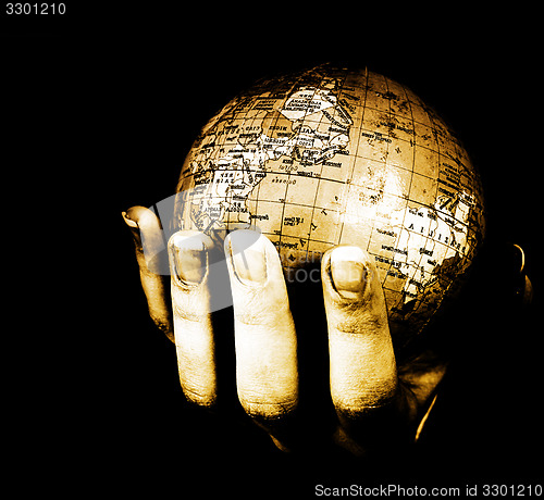 Image of Globe in a girl\'s hands