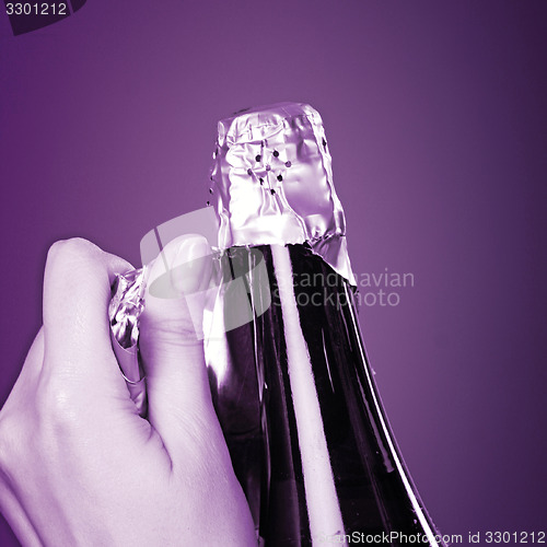 Image of Opening champagne bottle