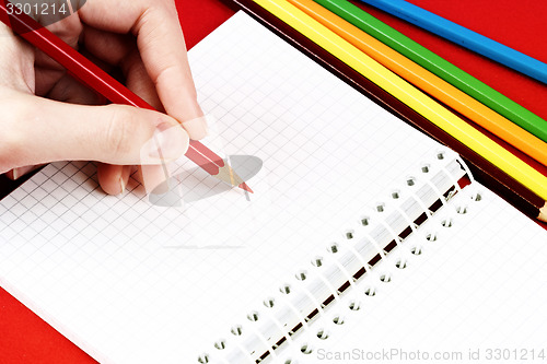 Image of Pencil and agenda