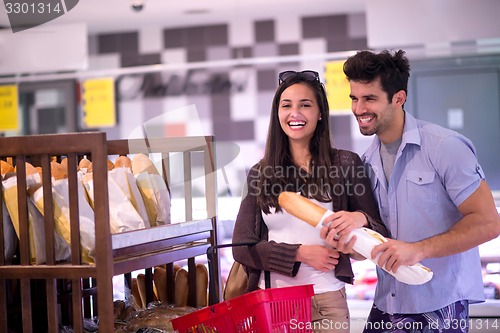 Image of couple shopping in a supermarket