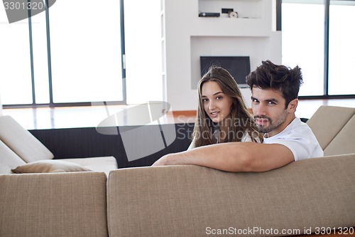 Image of happy young romantic couple have fun arelax  relax at home