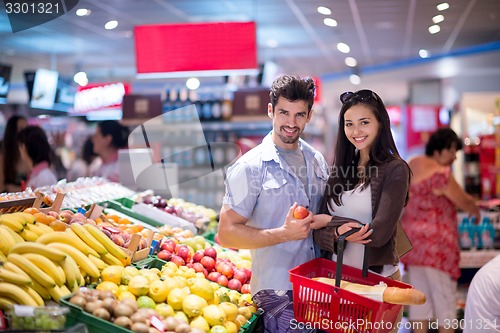 Image of couple shopping in a supermarket