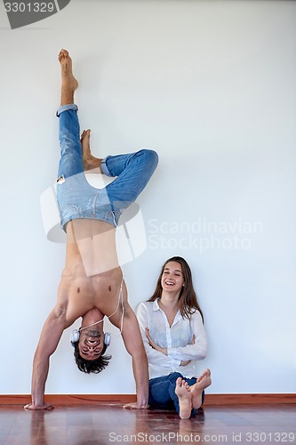 Image of happy young romantic couple have fun arelax  relax at home