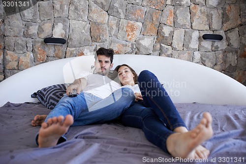 Image of couple relax and have fun in bed