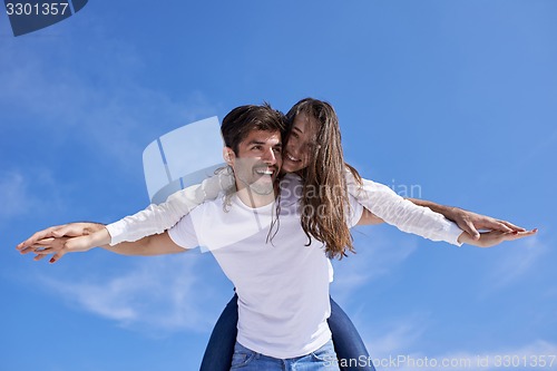 Image of happy young romantic couple have fun arelax  relax at home