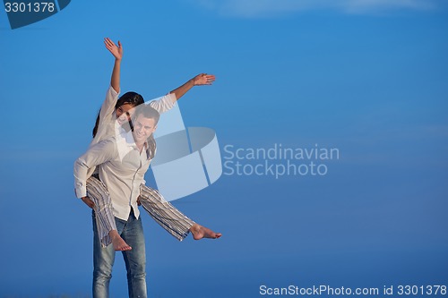 Image of happy young romantic couple have fun arelax  relax at home