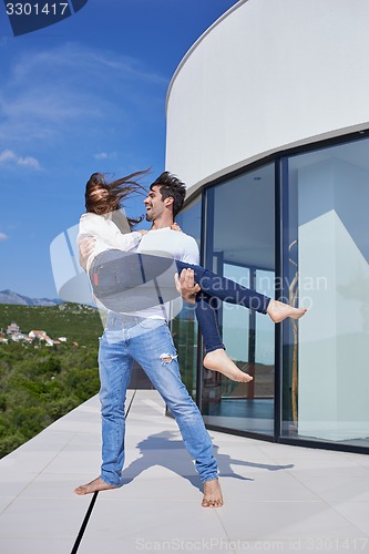 Image of happy young romantic couple have fun arelax  relax at home