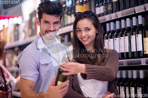 Image of couple shopping in a supermarket