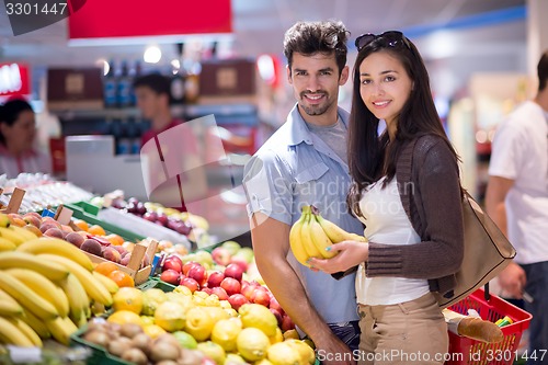 Image of couple shopping in a supermarket