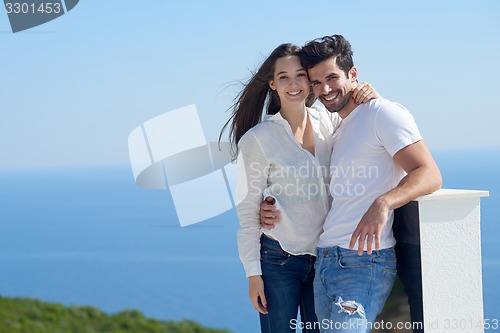 Image of happy young romantic couple have fun arelax  relax at home