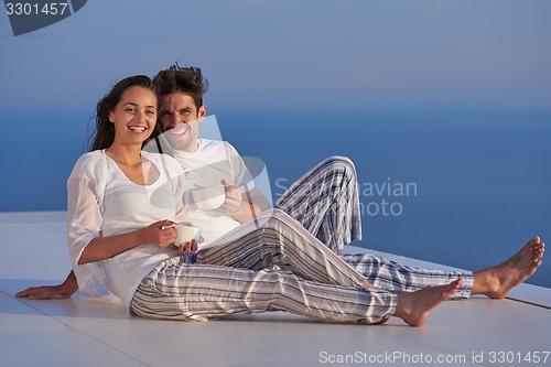 Image of happy young romantic couple have fun arelax  relax at home