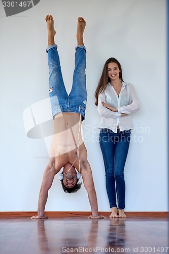 Image of happy young romantic couple have fun arelax  relax at home