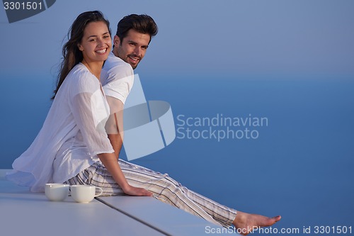 Image of happy young romantic couple have fun arelax  relax at home