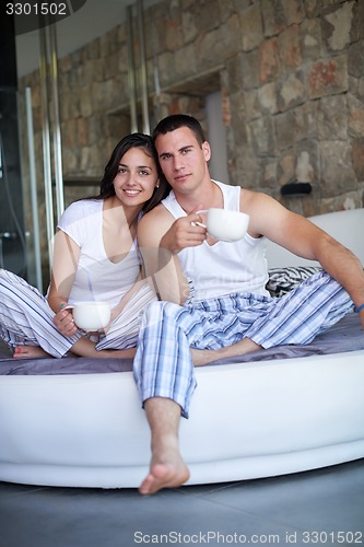 Image of couple relax and have fun in bed