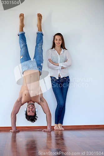 Image of happy young romantic couple have fun arelax  relax at home