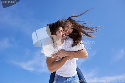 Image of happy young romantic couple have fun arelax  relax at home