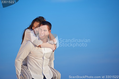 Image of happy young romantic couple have fun arelax  relax at home