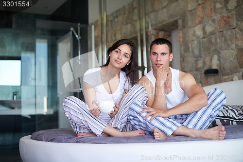 Image of couple relax and have fun in bed