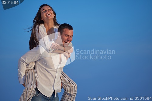 Image of happy young romantic couple have fun arelax  relax at home