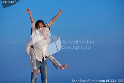 Image of happy young romantic couple have fun arelax  relax at home