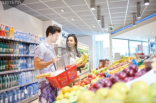 Image of couple shopping in a supermarket