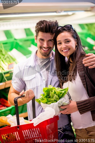 Image of couple shopping in a supermarket