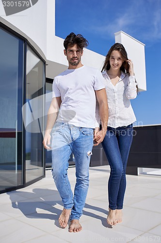 Image of happy young romantic couple have fun arelax  relax at home