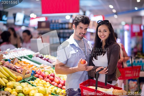 Image of couple shopping in a supermarket