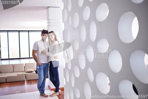 Image of relaxed young couple at home