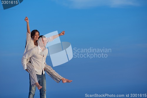 Image of happy young romantic couple have fun arelax  relax at home