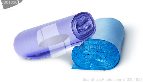 Image of Two multicolored rolls of plastic garbage bags