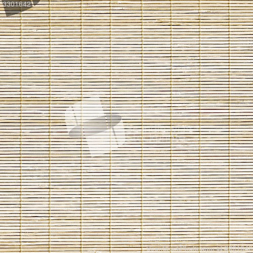 Image of mat made of wooden sticks