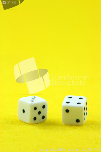 Image of dices in yellow vertical