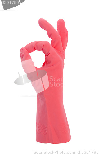 Image of Hand gesturing with red cleaning product glove