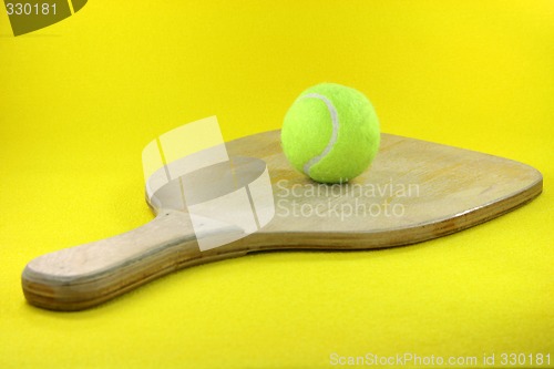 Image of racket and ball