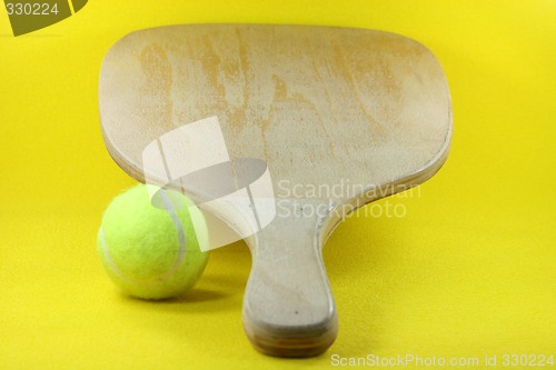 Image of racket with ball