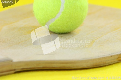 Image of wooden racket detail