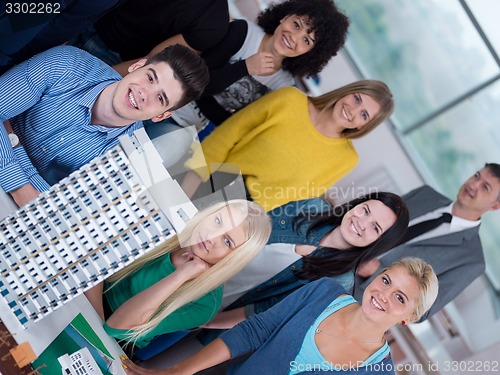 Image of students with teacher  in computer lab classrom