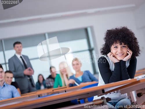 Image of students with teacher  in computer lab classrom