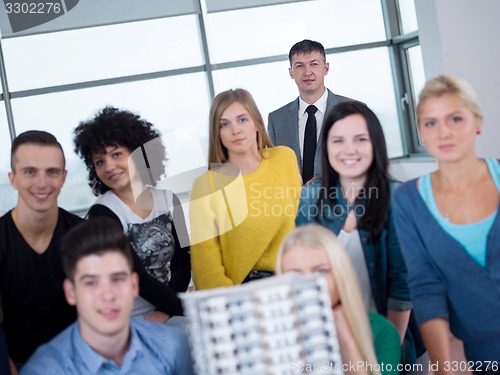 Image of students with teacher  in computer lab classrom