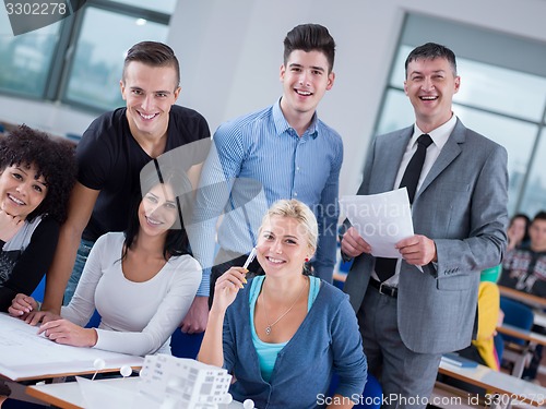 Image of students with teacher  in computer lab classrom