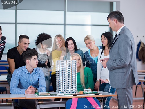 Image of students with teacher  in computer lab classrom