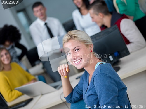 Image of students with teacher  in computer lab classrom