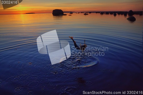 Image of Sunset river perch fishing with the boat and a rod