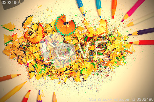 Image of The word LOVE on the background from pencil shavings