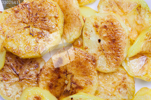 Image of slices of baked potatoes