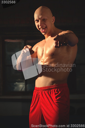 Image of Russian boxer in red shorts