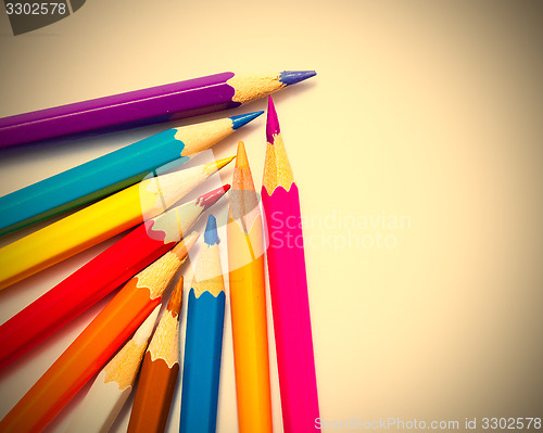 Image of colored pencils on white background