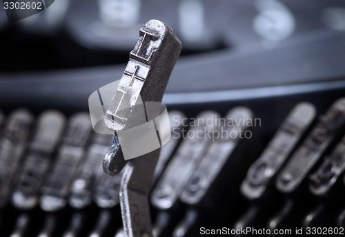 Image of L hammer - old manual typewriter - cold blue filter