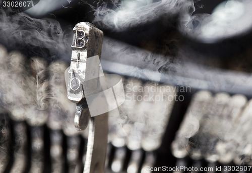 Image of B hammer - old manual typewriter - mystery smoke